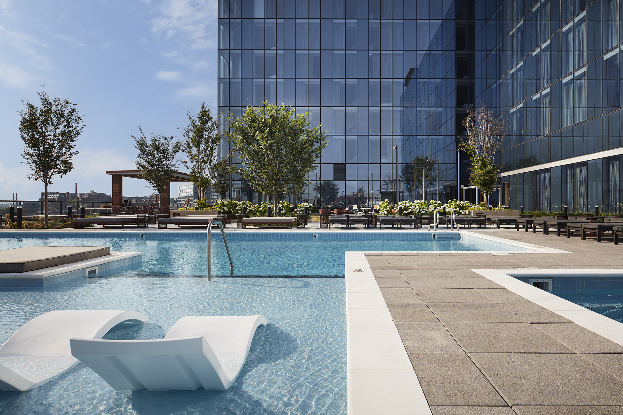 Pool at SCB's Four Seasons Hotel and Private Residences. Architecture. Hospitality. Mixed-use. Retail. Residential.